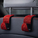 red rhinestone car headrest hooks installed on car seat headrest. A premium and unique car organizer by Car-Wah! for your daily commute