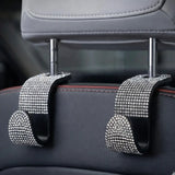 silver rhinestone car headrest hooks car seat organizer hooks installed. An aesthetic Car-Wah! car storage solution to keep your car neat and happy.
