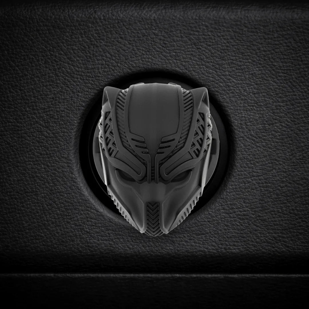 black panther engine start button cover installed on car dashboard