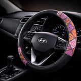 Colourful fabric steering wheel cover installed inside car interior with enhanced grip. A unique Car-Wah! car accessories for driving comfort upgrade.
