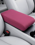 Pink suede car armrest cover with memory foam installed on center console. A unique Car-Wah! comfort car accessory for your daily drive.
