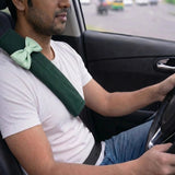 Green seatbelt cushion reducing seat belt rubbing on neck