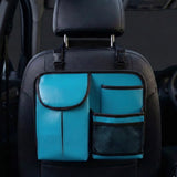 Teal compact car seat back organizer installed behind front seat. A unique Car-Wah! car organizer for a stress-free drive.