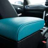 Memory foam car armrest cover in Teal – close-up of PU leather texture and padded surface