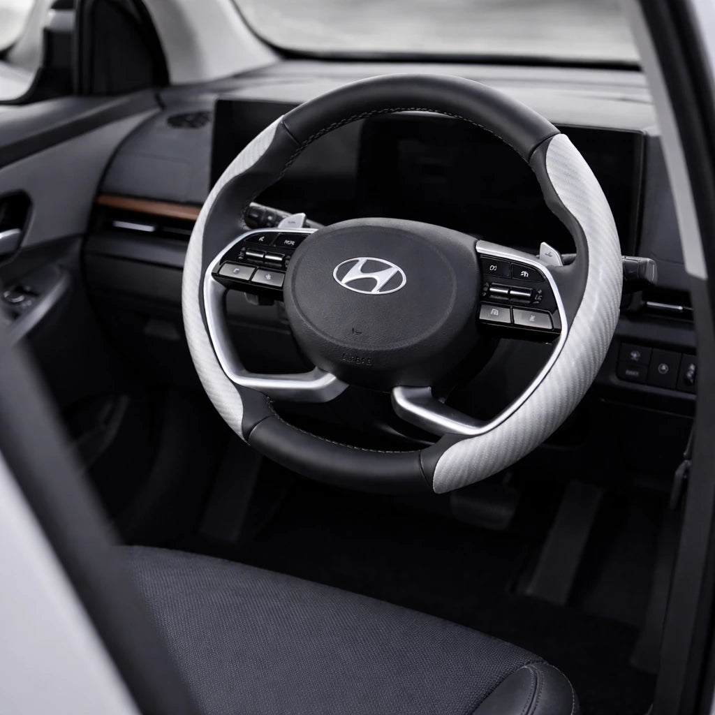 silver carbon fibre steering wheel cover wide interior lifestyle image. A premium Car-Wah! car accessory for an instant car interior upgrade.