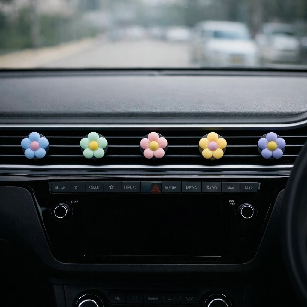 Flower car air freshener vent clips in multiple colours decorating car dashboard AC vents. A unique Car-Wah! car fragrance to keep your car cabin smelling extraordinary.