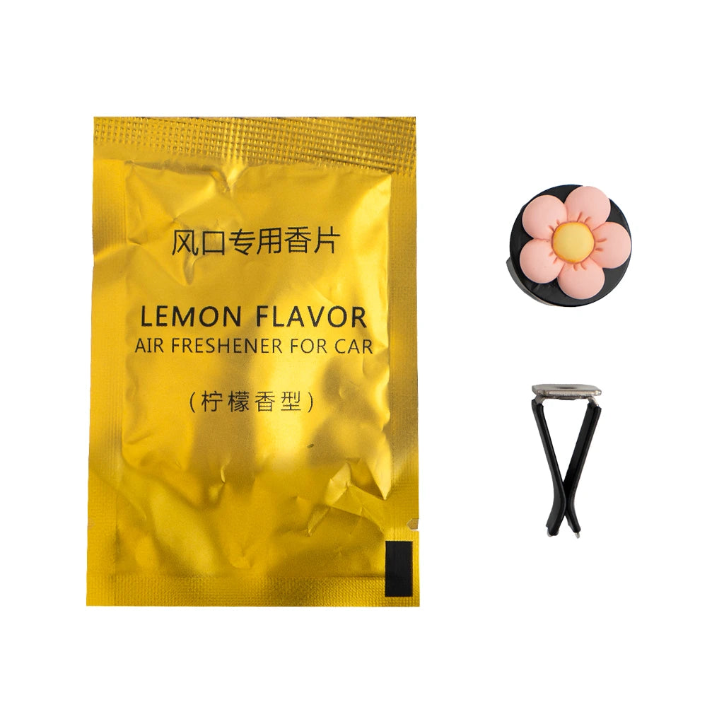 Pink flower car air freshener vent clip with refill fragrance pad and vent clip. An aesthetic car freshener by Car-Wah!, car perfume for long-lasting freshness