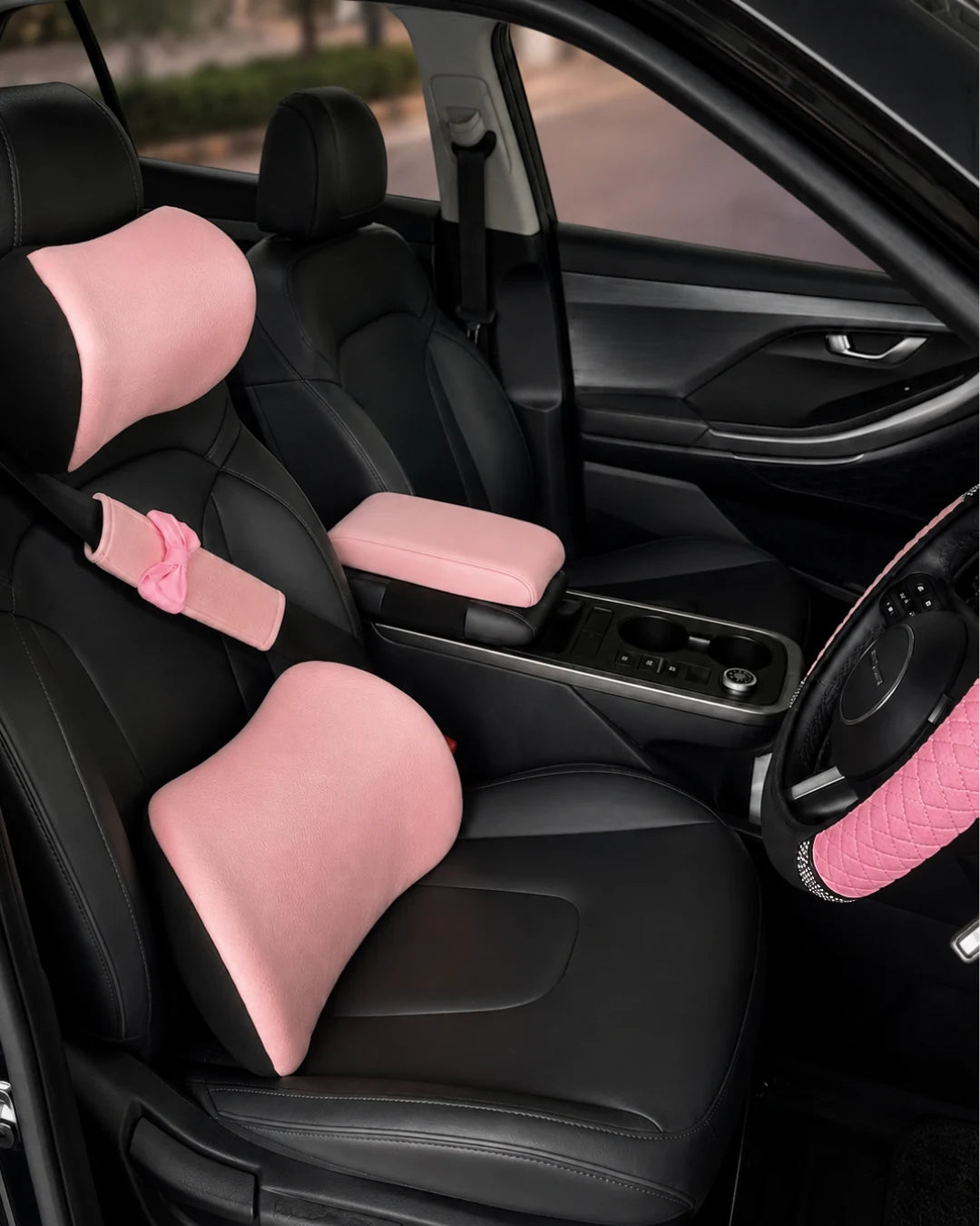 Pink Car-Wah! comfort bundle installed inside a car with matching comfort accessories