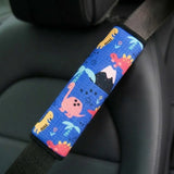 Blue kids seat belt cover installed on car seat – soft neck cushion for children. A unique and pratical Car-Wah! comfort car accessory for your ride.