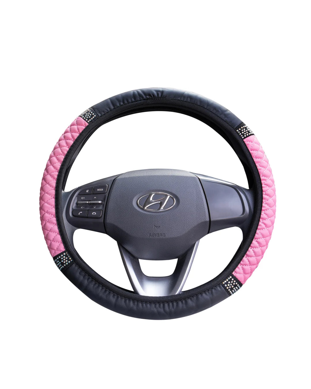 Pink PU leather steering wheel cover with anti-slip rubber lining and rhinestone detailing on 38 cm steering wheel.  A colourful Car-Wah! car decor upgrade for your daily drives.
