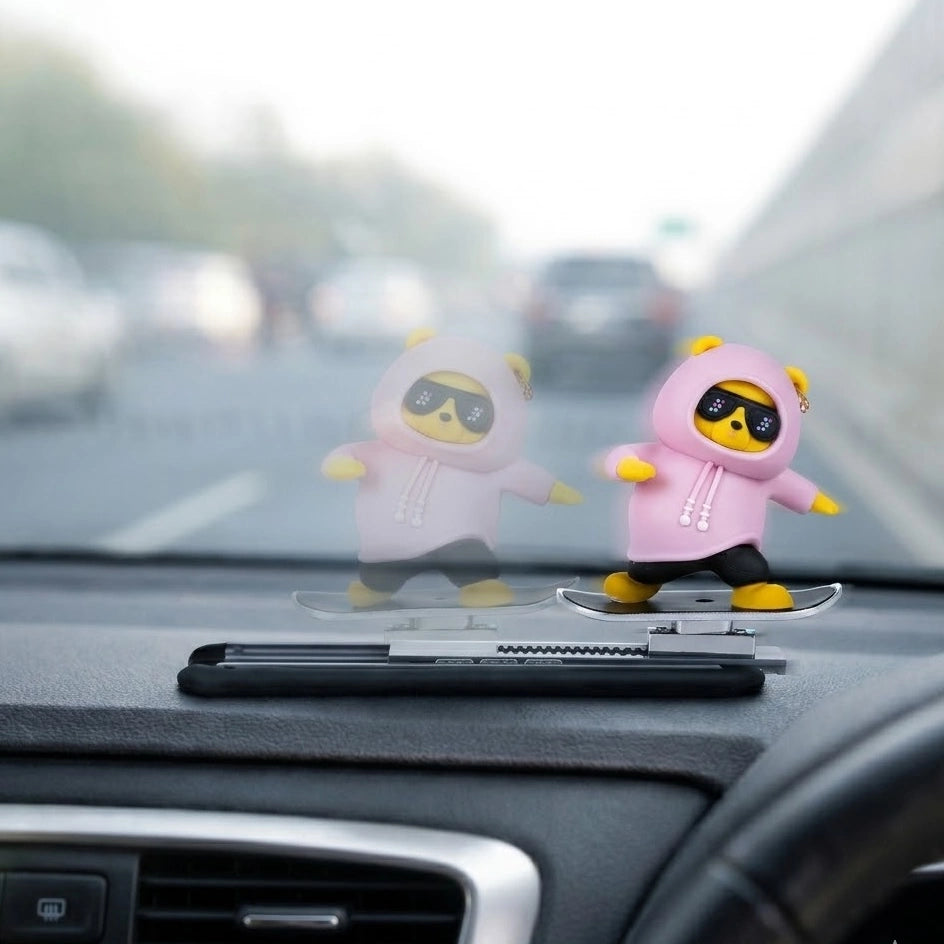 Pink sliding panda dashboard decor moving on car dashboard – cute panda car interior accessory. A  Car-Wah! aesthetic upgrade car accessory for your space on wheels.