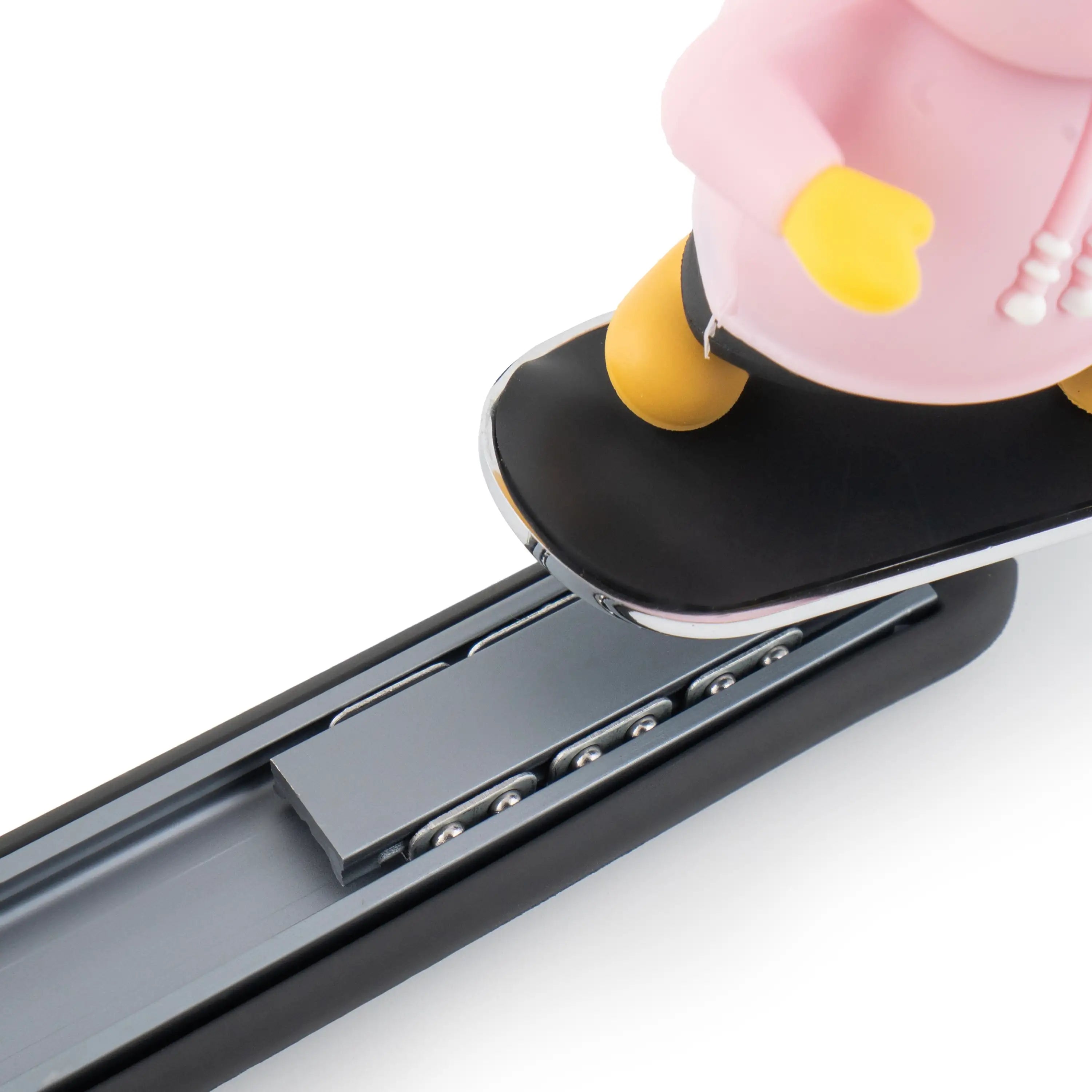 Close-up of sliding track mechanism for panda car dashboard decor showing smooth gliding base. A quirky Car-Wah! car accessory that adds instant personality to your car. 