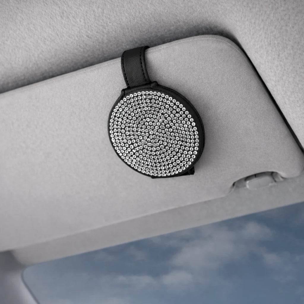 Silver bling visor clip sunglasses holder on car visor. A practical and aesthetic car accessory by  Car-Wah! to keep your world on wheels organized.
