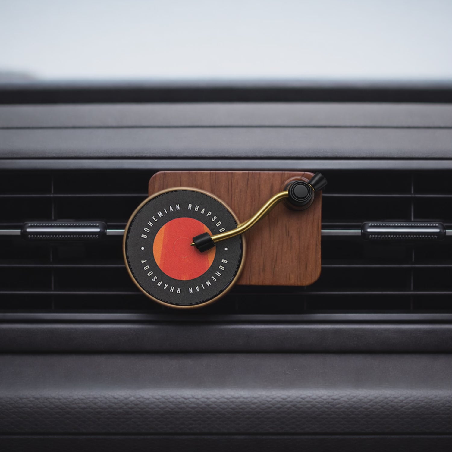 Spinning record player car air freshener with Folklore, Evermore and Midnights perfume discs rotating on car AC vent. An aesthetic car freshener by Car-Wah!  for your daily commute.
