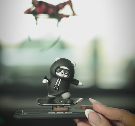 Sliding panda car dashboard decor moving side to side. A quirky Car-Wah! car accessory that adds instant personality to your car. 
