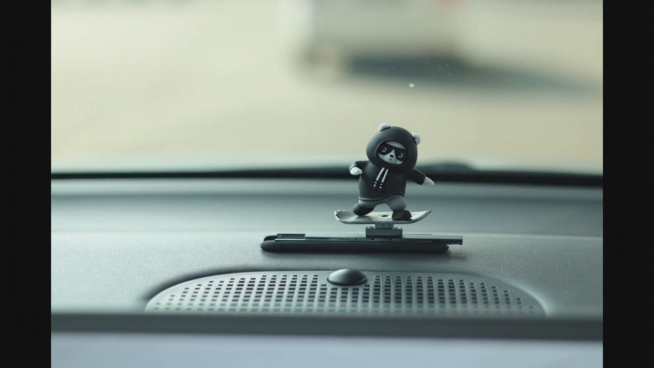 Sliding Panda Car Dashboard Decor in motion – moving panda dashboard accessory gliding with car movement. A  Car-Wah! aesthetic upgrade car accessory for your space on wheels.