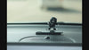 Sliding Panda Car Dashboard Decor in motion – moving panda dashboard accessory gliding with car movement. A  Car-Wah! aesthetic upgrade car accessory for your space on wheels.