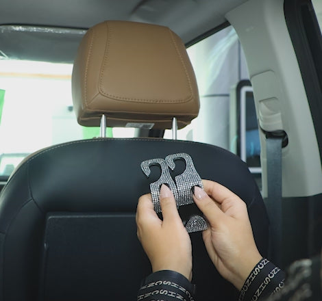 Easy tool-free installation of car headrest hooks onto seat headrest. A premium and unique car organizer by Car-Wah! for your daily commute.
